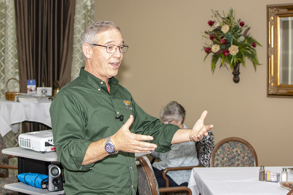 Bob Googe speaking and gesturing with arms